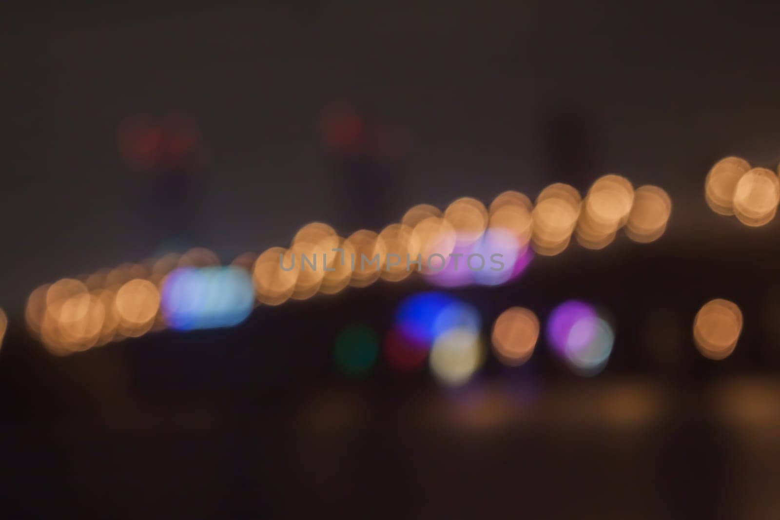 blurred street bokeh with warm colorful lights for background usage