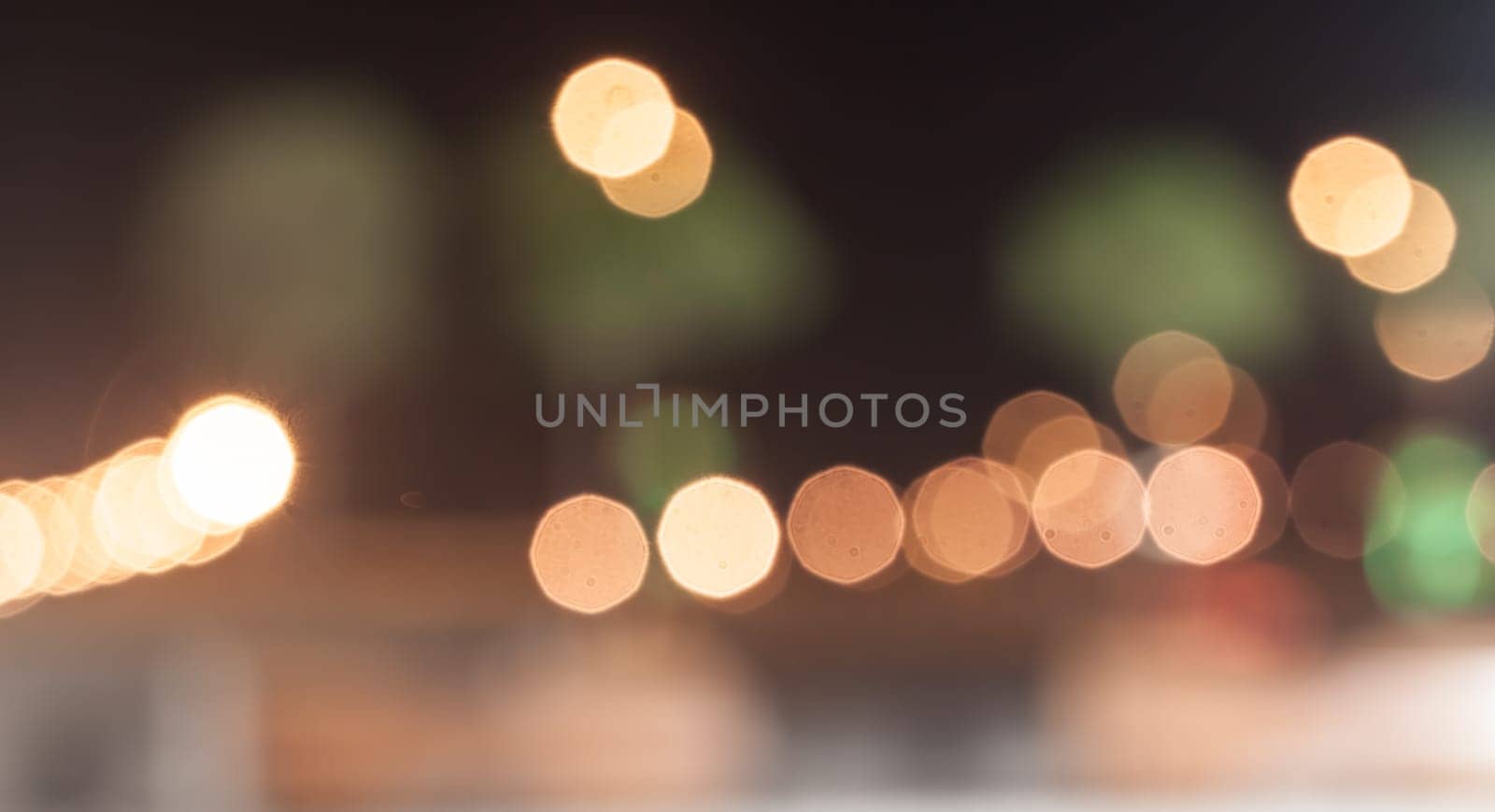 blurred street bokeh with warm colorful lights for background usage