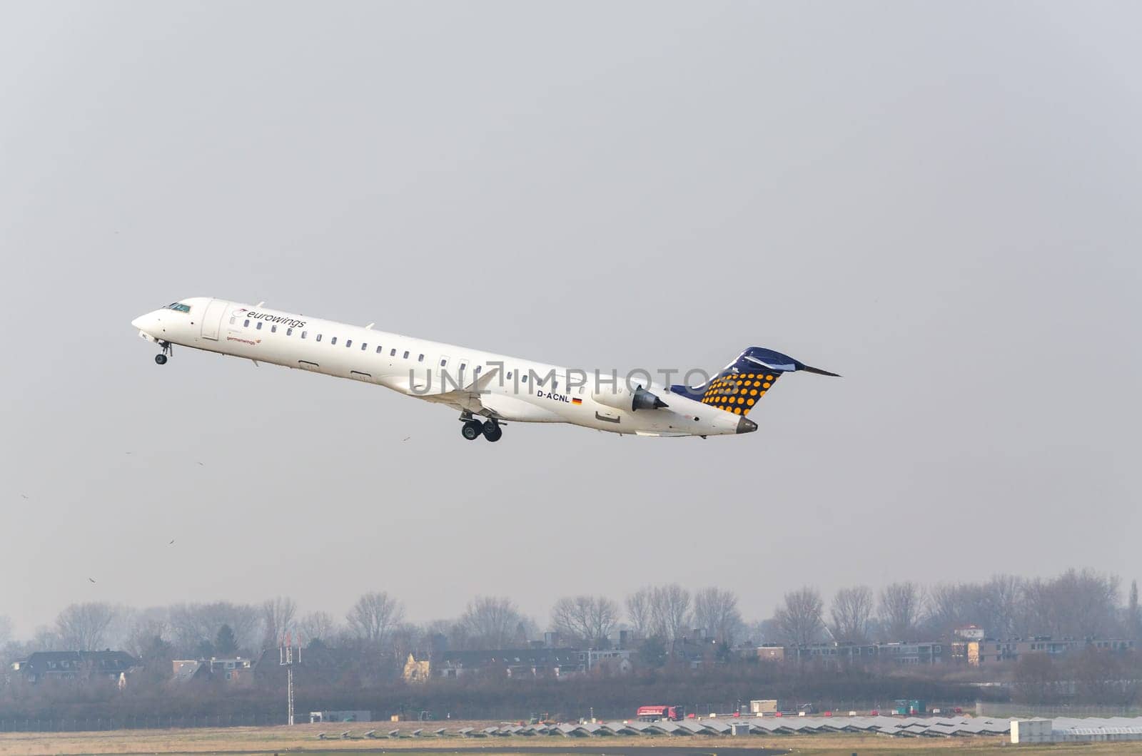 Duesseldorf,Nrw,Germany - March 18,2015: . Eurowings Canadair Regional Jet during take-off at Düsseldorf Airport.