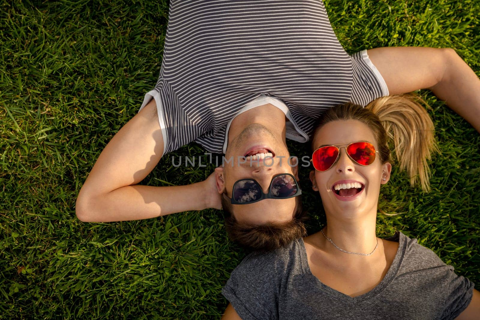 Portrait of a happy young couple embraced