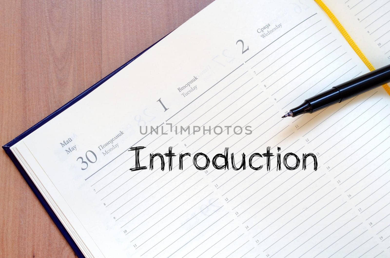 Introduction text concept write on notebook