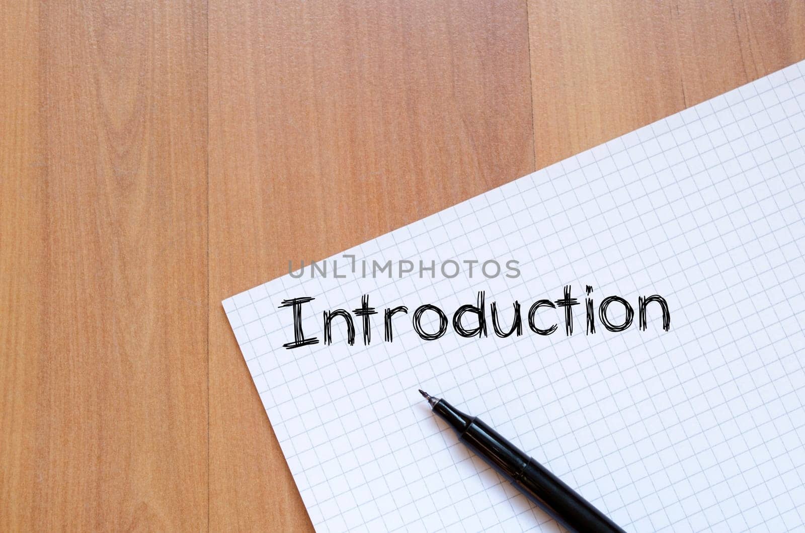 Introduction text concept write on notebook