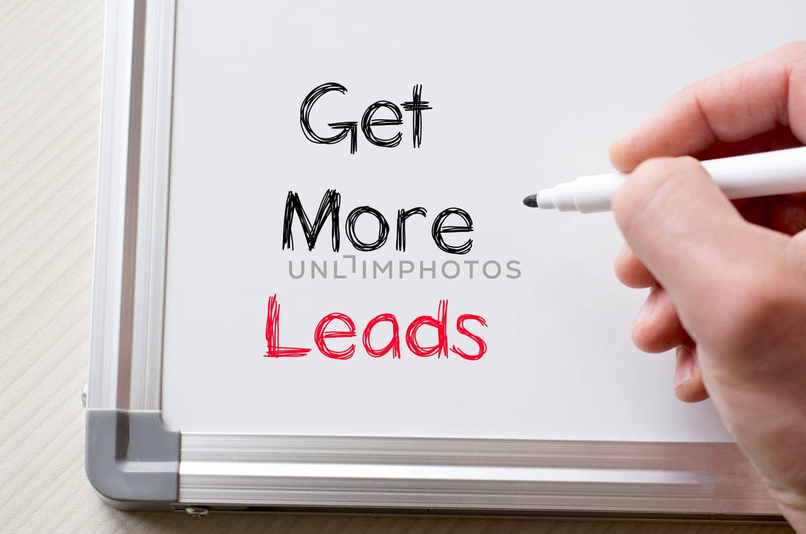 Human hand writing get more leads on whiteboard