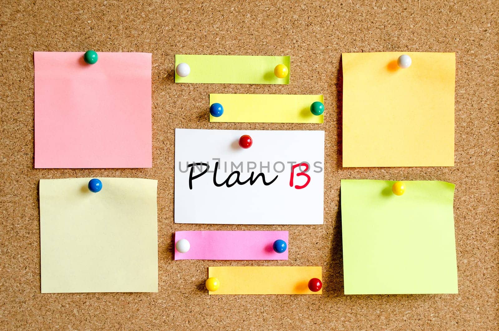 Sticky note on cork board background and text concept