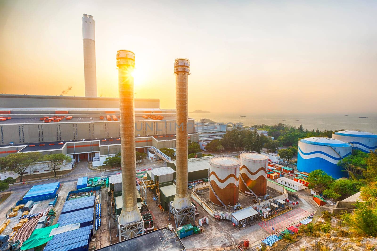 Hong Kong power station at sunset , Glow light of petrochemical industry