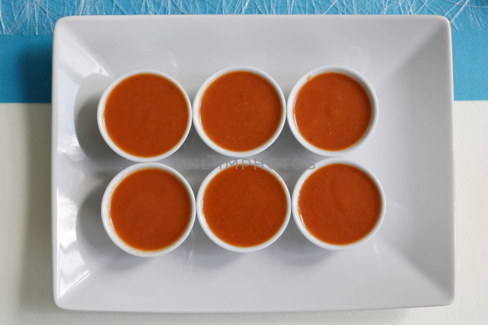 Top view of appetizers on a white plate