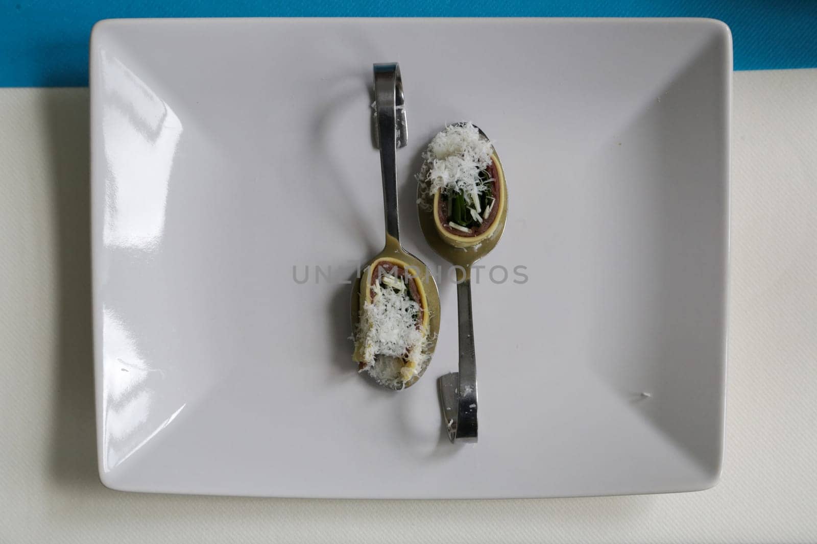 Top view of appetizers on a white plate