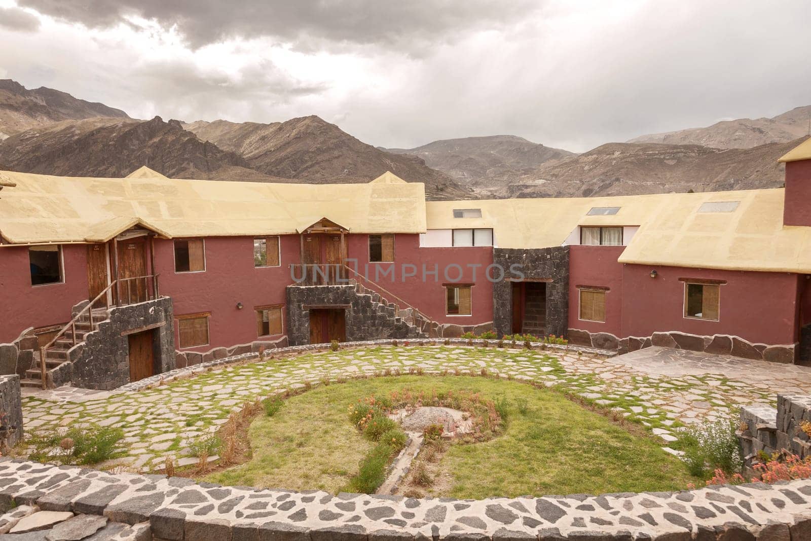 CHIVAY, AREQUIPA, PERU - NOVEMBER 25, 2015: View of a traditional vintage hotel in Chivay, Arequipa Peru with clouds.