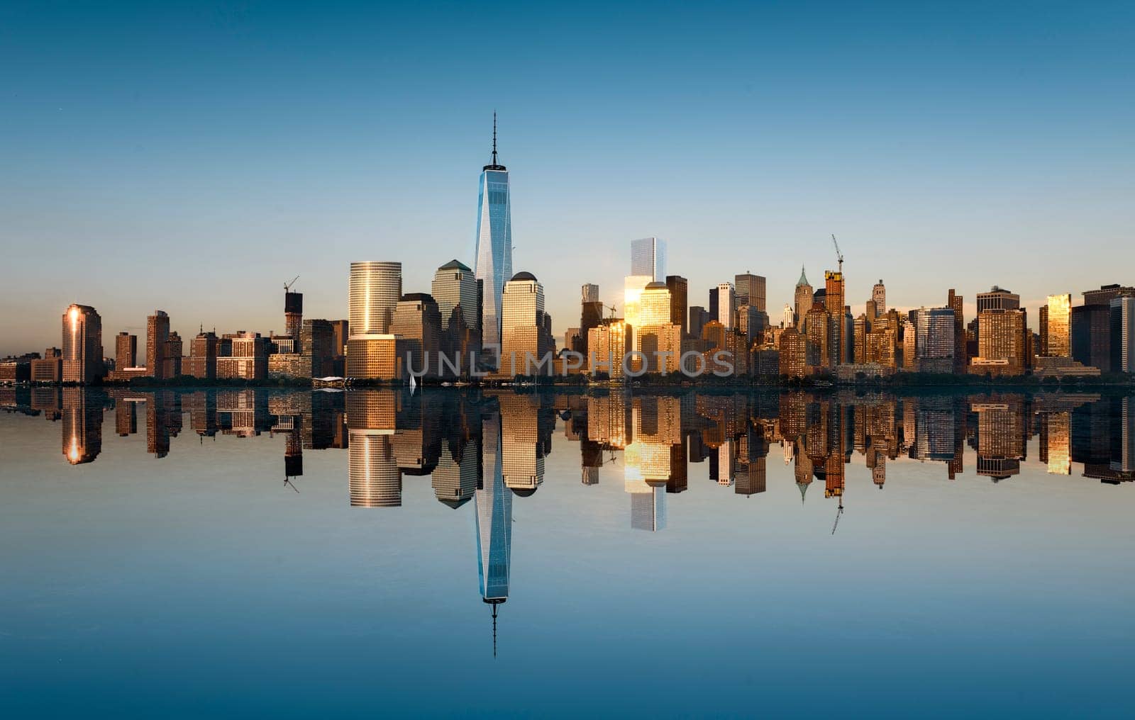 New York City skyline with urban skyscrapers at sunset, USA.