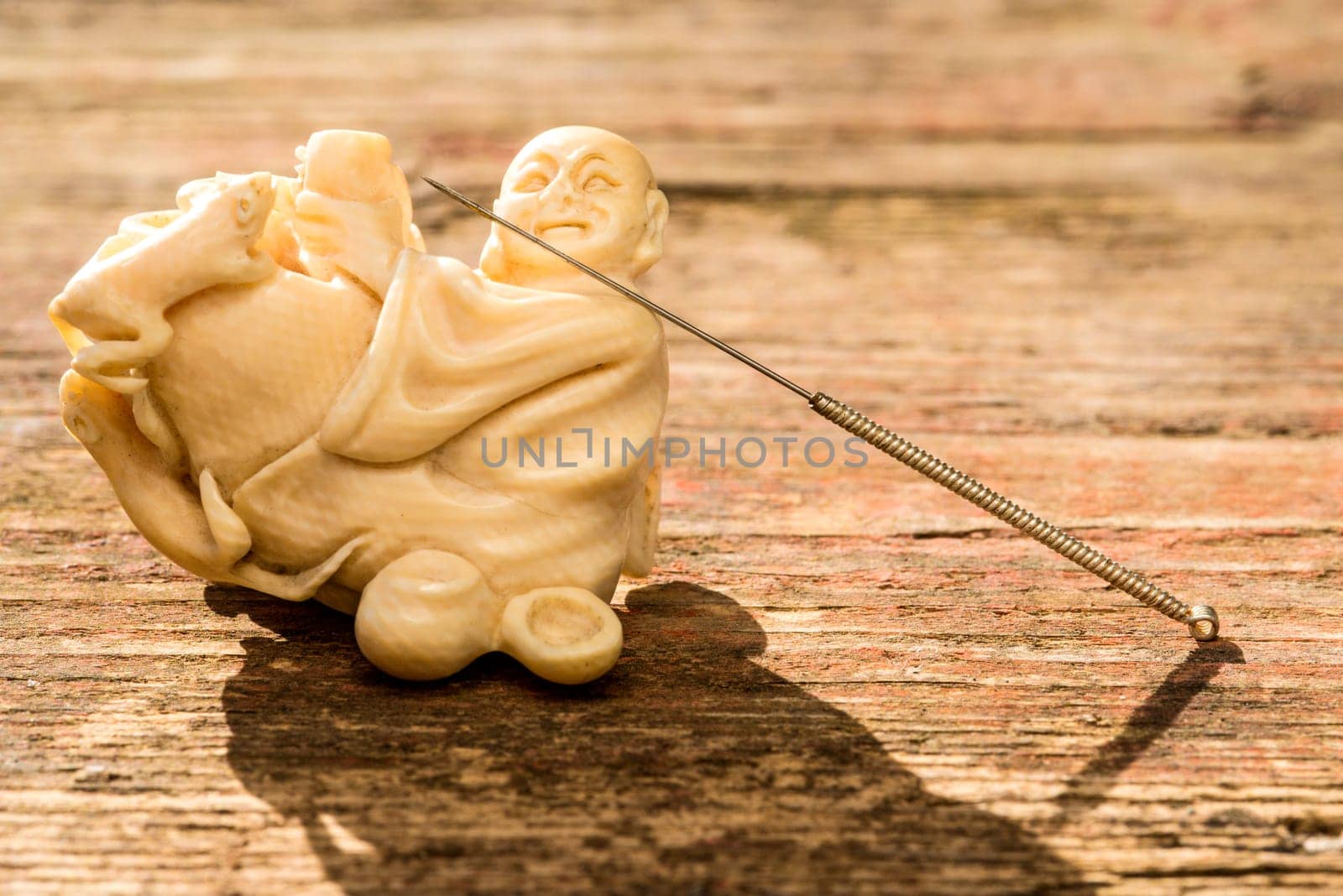 Acupuncture needle on Chinese,antique figure