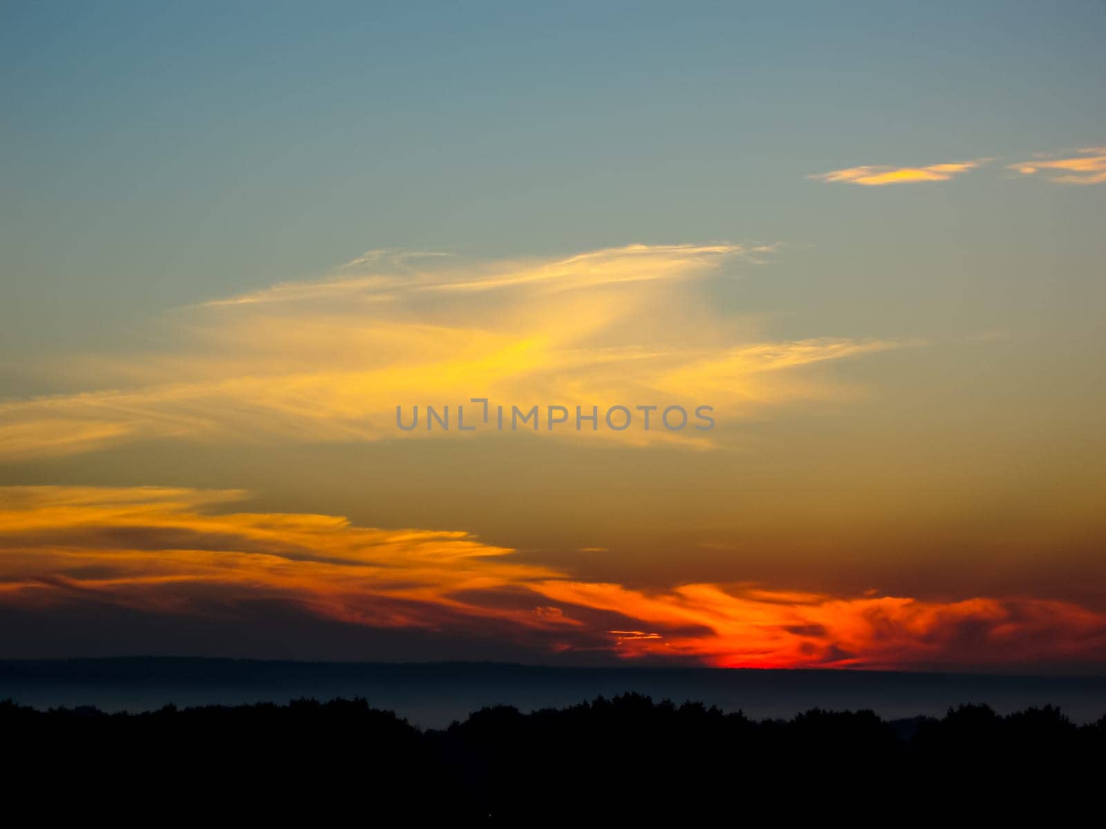 Sunset landscape. Horizon at sunset. Red black paint
