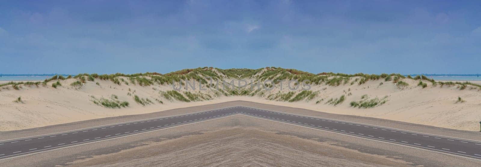Panorama of a sunny natural landscape with large sand duene in the Netherlands.