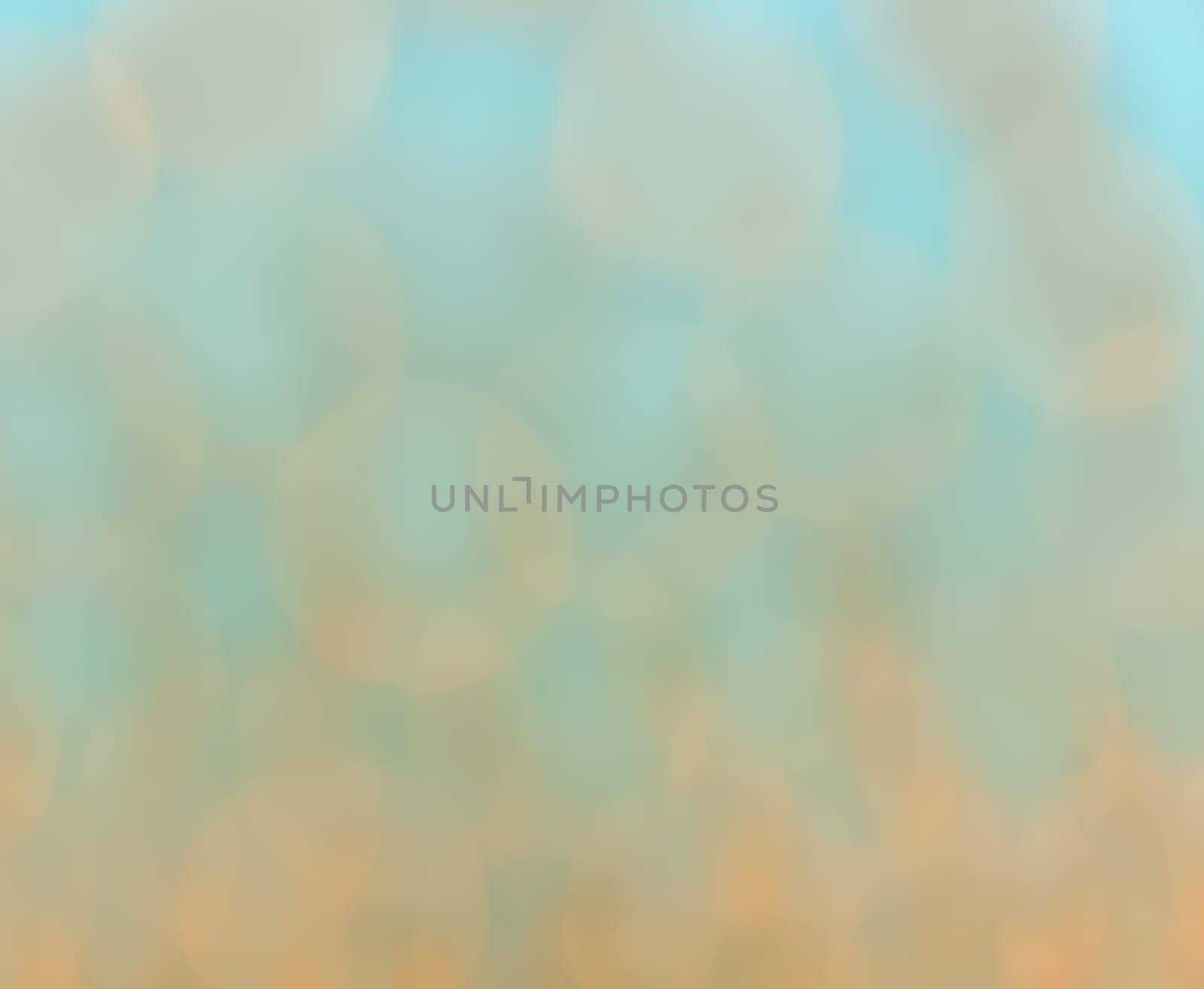 Yellow bokeh abstract of de-focused Christmas lights on green background