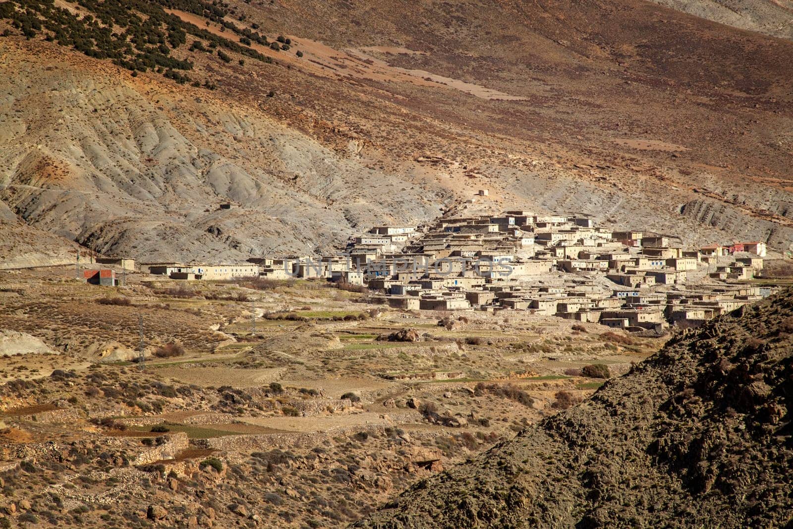 Rural remote Moroccan village at sunset  in the High Atlas Mountains  in Morocco.