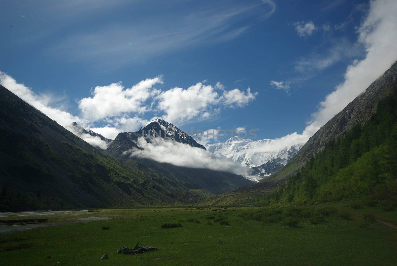 Mountain landscape. Highlands, the mountain peaks, gorges and valleys. The stones on the slopes.