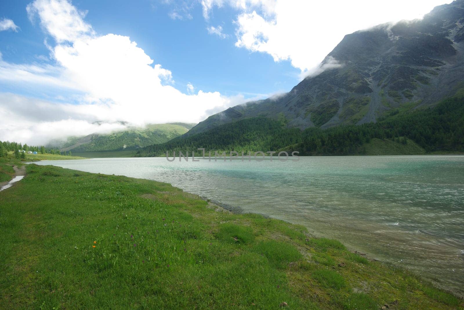 Mountain landscape. Highlands, the mountain peaks, gorges and valleys. The stones on the slopes.