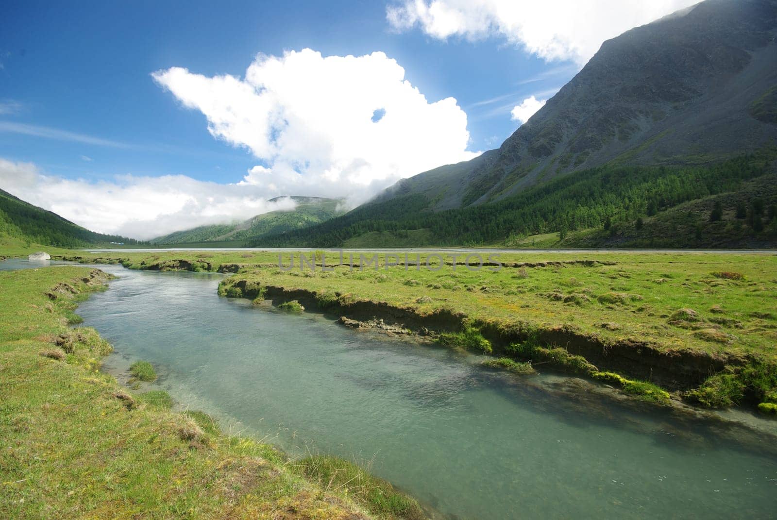 Mountain landscape. Highlands, the mountain peaks, gorges and valleys. The stones on the slopes.