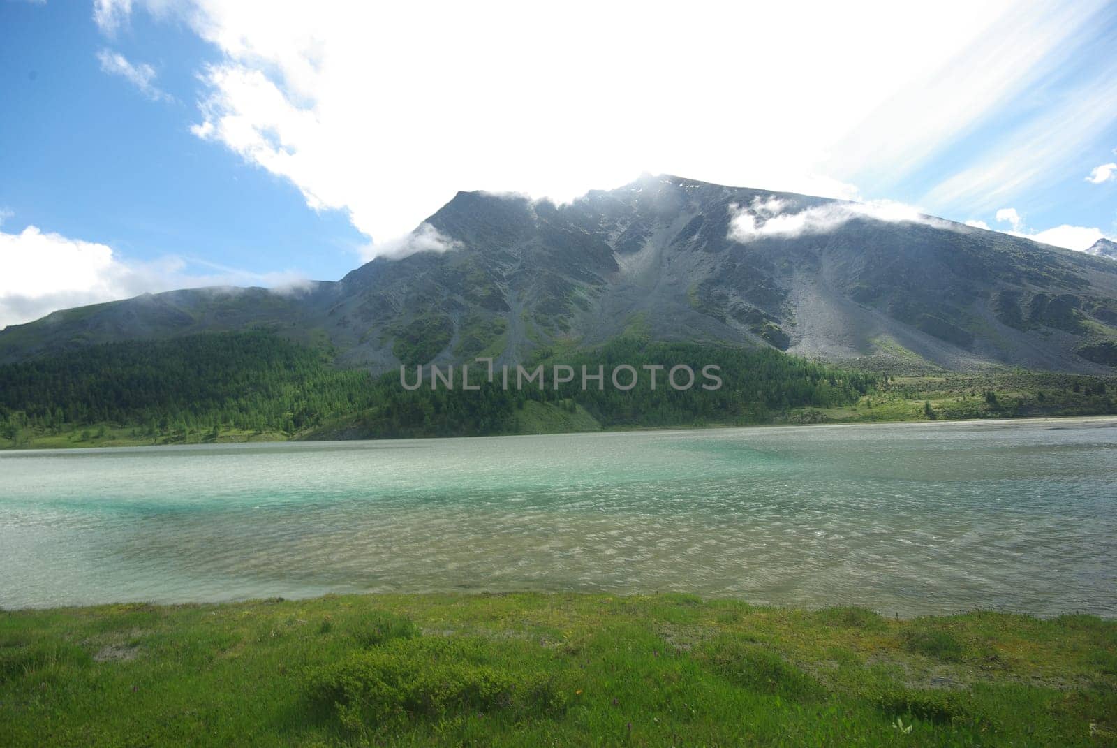 Mountain landscape. Highlands, the mountain peaks, gorges and valleys. The stones on the slopes.