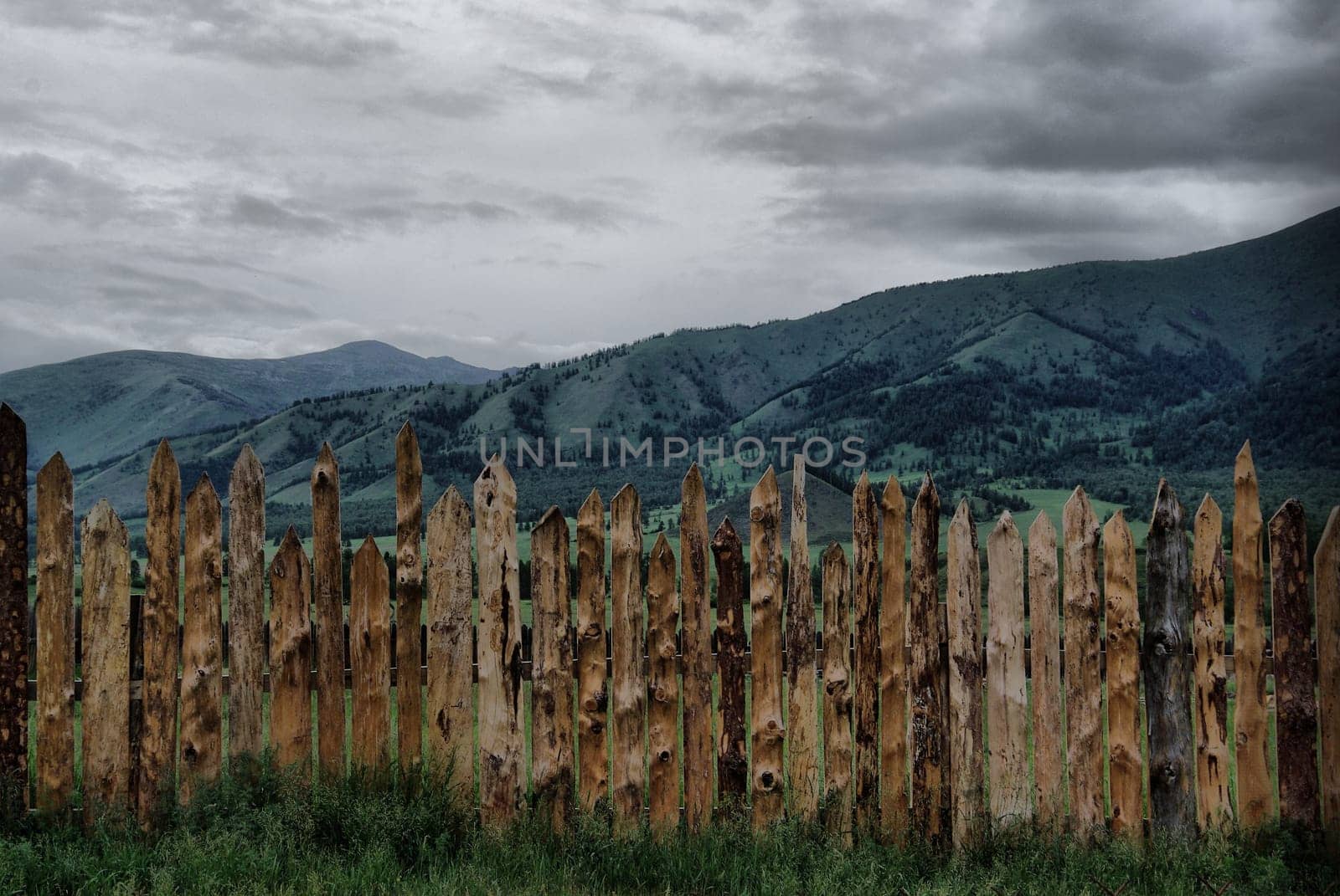 Beautiful mountain landscape near the lake. Mountain Lake. Kind of mountainous terrain and the water in the valley.