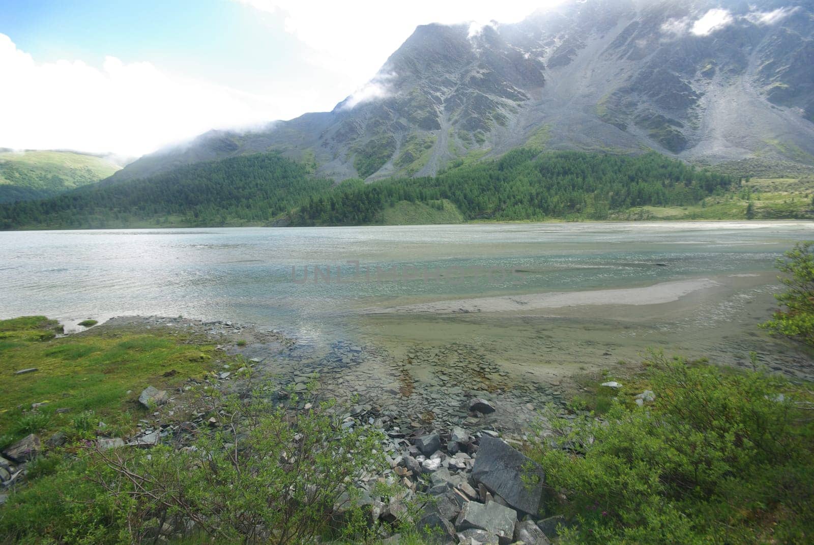 Mountain landscape. Highlands, the mountain peaks, gorges and valleys. The stones on the slopes.