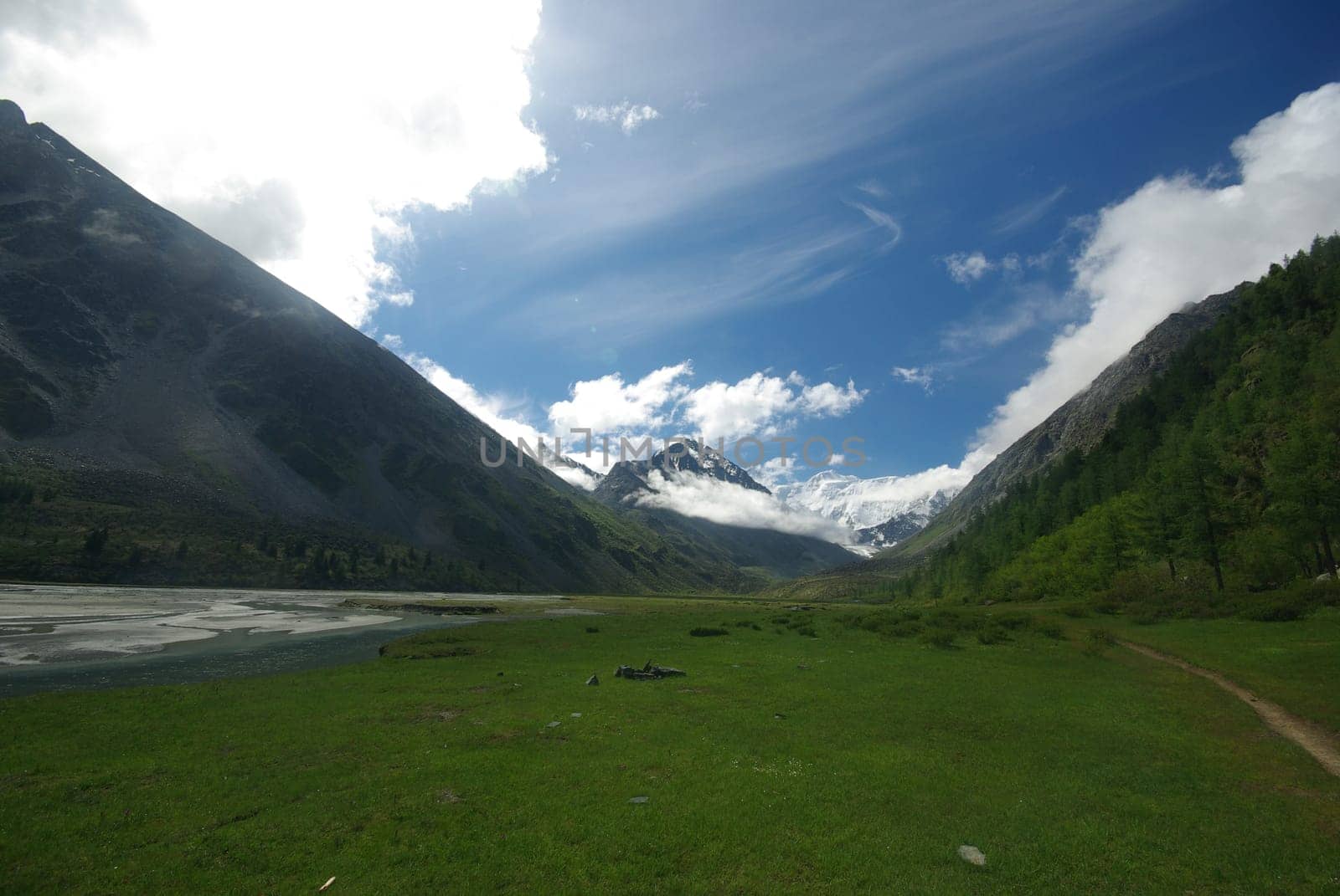 Mountain landscape. Highlands, the mountain peaks, gorges and valleys. The stones on the slopes.