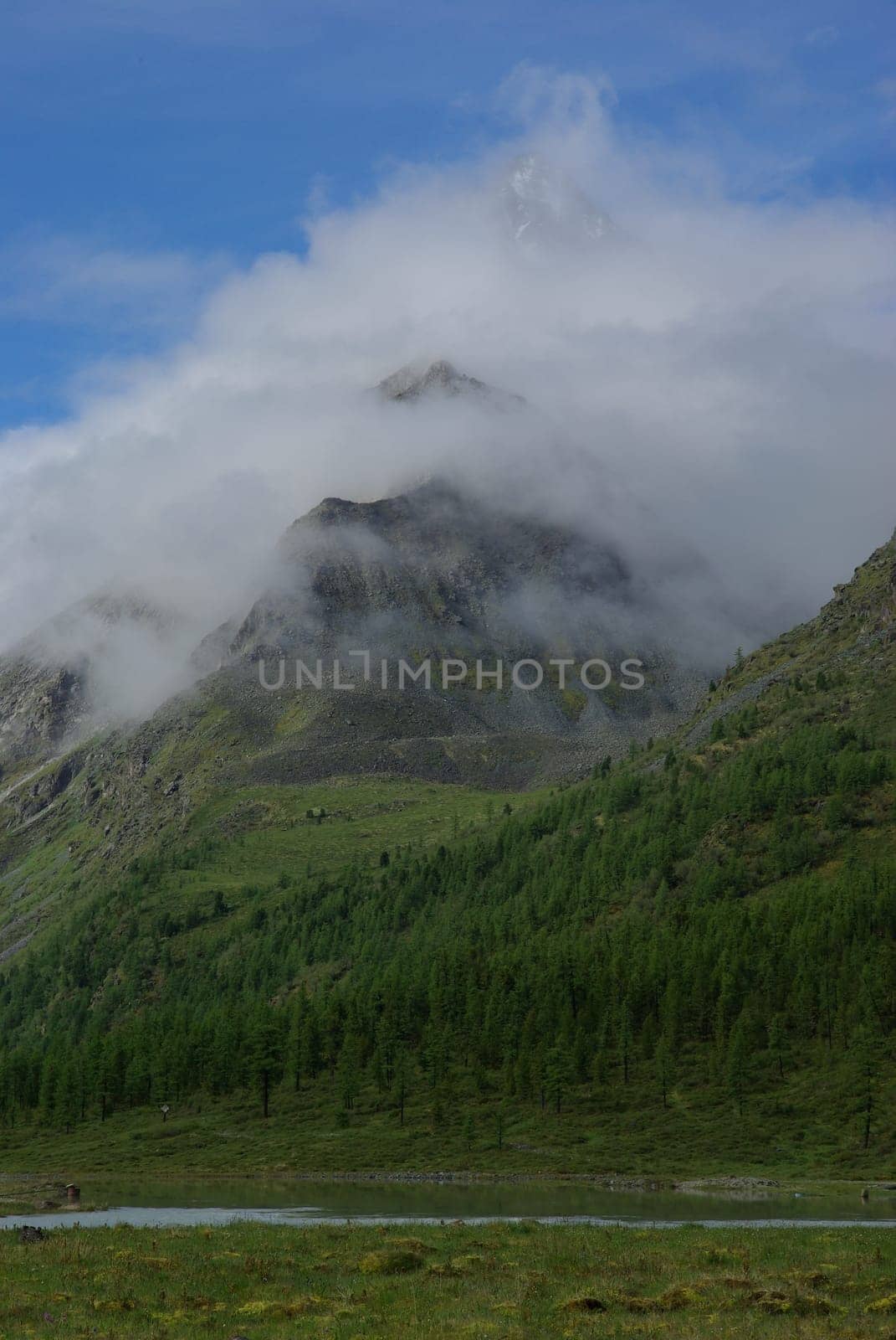 Mountain landscape. Highlands, the mountain peaks, gorges and valleys. The stones on the slopes.