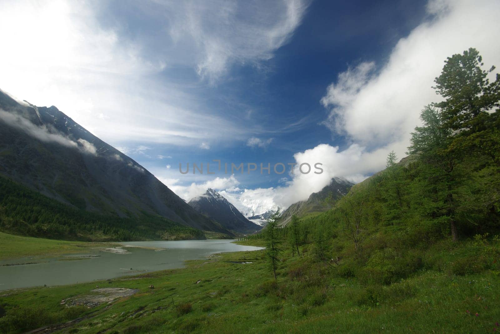 Mountain landscape. Highlands, the mountain peaks, gorges and valleys. The stones on the slopes.