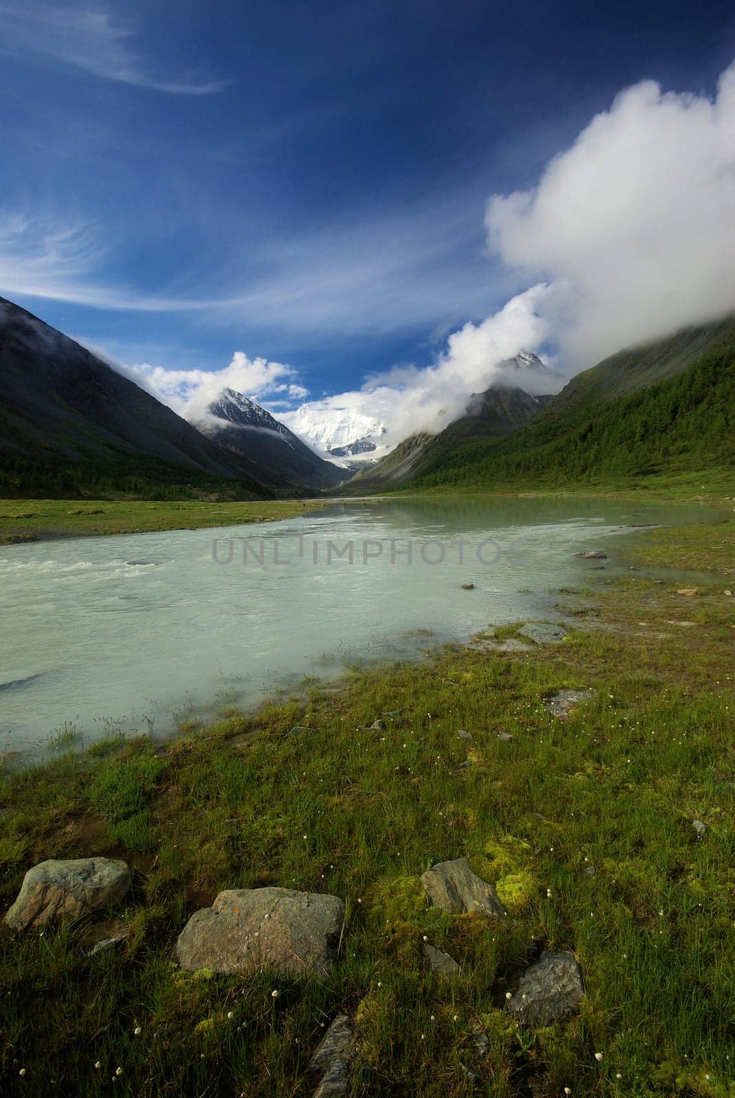 Mountain landscape. Highlands, the mountain peaks, gorges and valleys. The stones on the slopes.