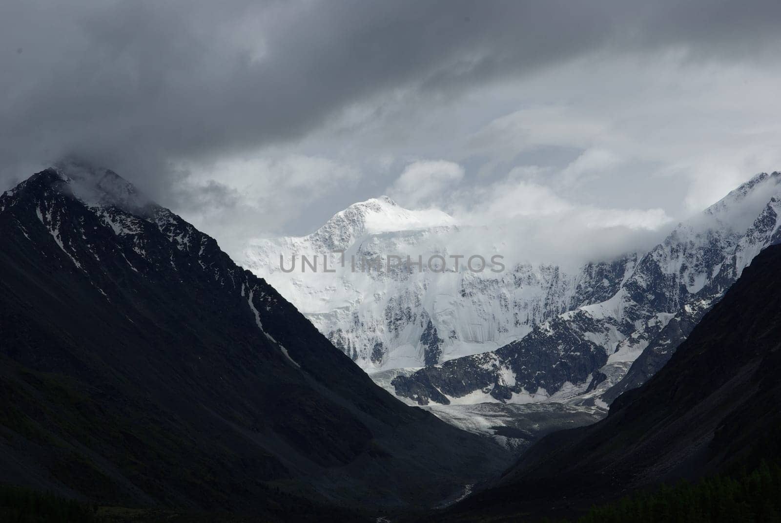 Mountain landscape. Highlands, the mountain peaks, gorges and valleys. The stones on the slopes.