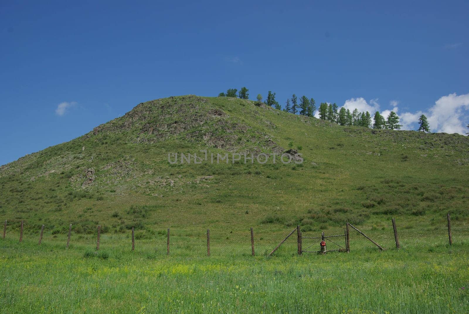 Mountain landscape. Highlands, the mountain peaks, gorges and valleys. The stones on the slopes.