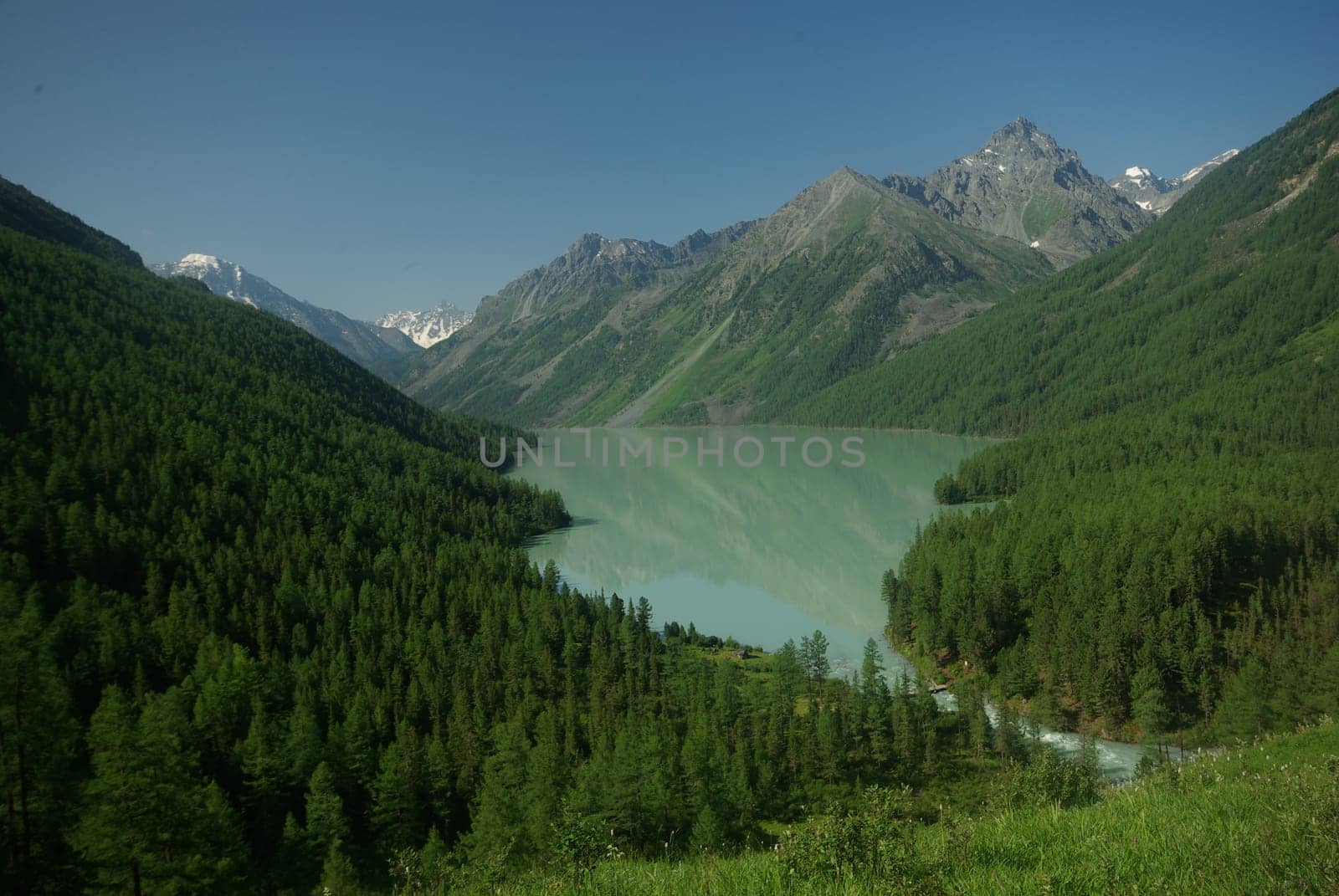 Mountain landscape. Highlands, the mountain peaks, gorges and valleys. The stones on the slopes.
