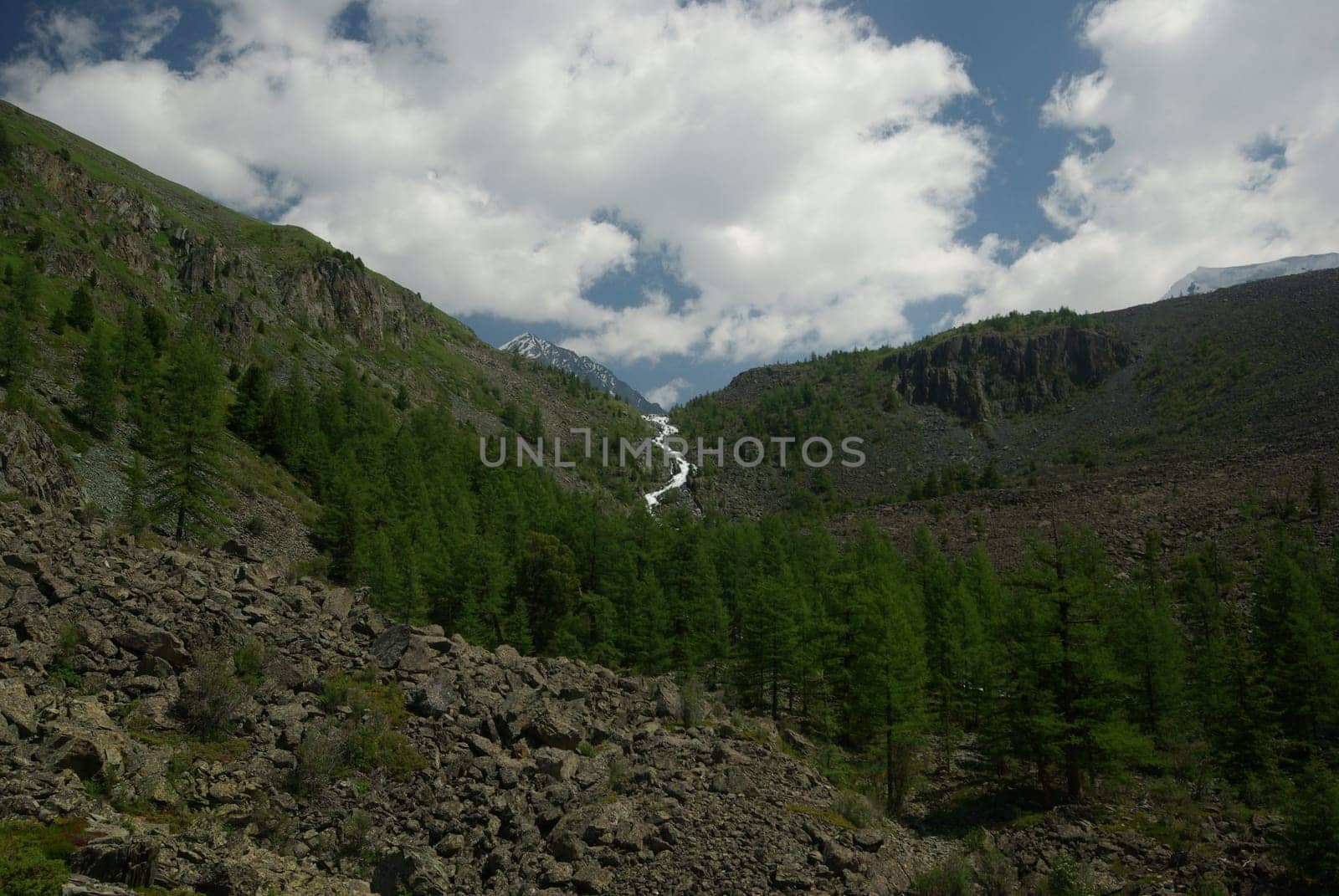 Mountain landscape. Highlands, the mountain peaks, gorges and valleys. The stones on the slopes.