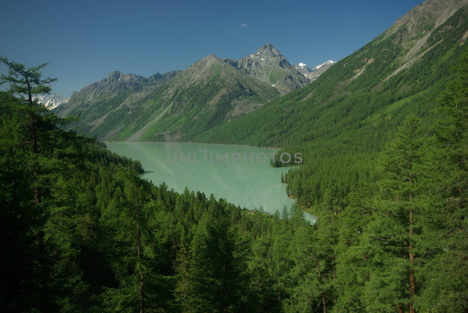 Mountain landscape. Highlands, the mountain peaks, gorges and valleys. The stones on the slopes.