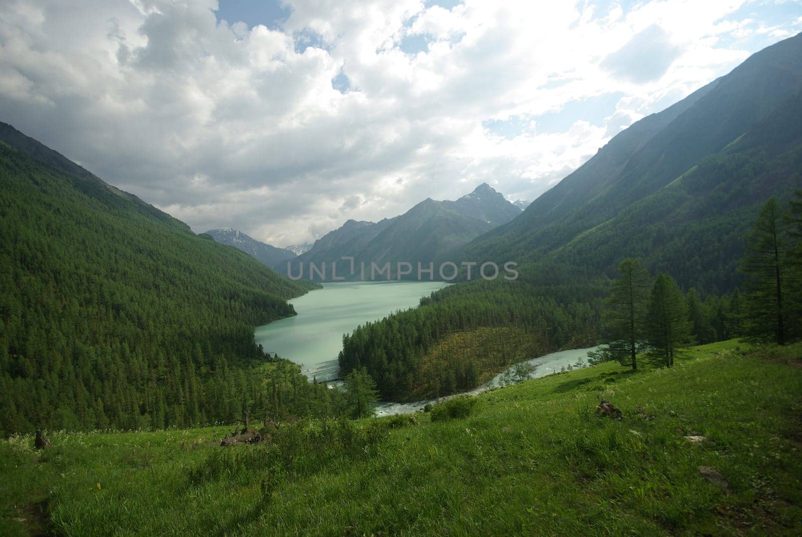 Mountain landscape. Highlands, the mountain peaks, gorges and valleys. The stones on the slopes.