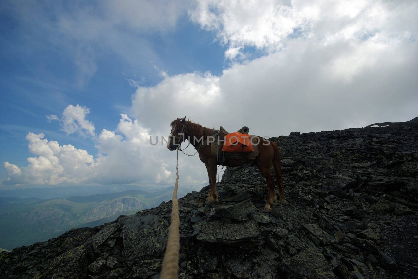 Mountain landscape. Highlands, the mountain peaks, gorges and valleys. The stones on the slopes.
