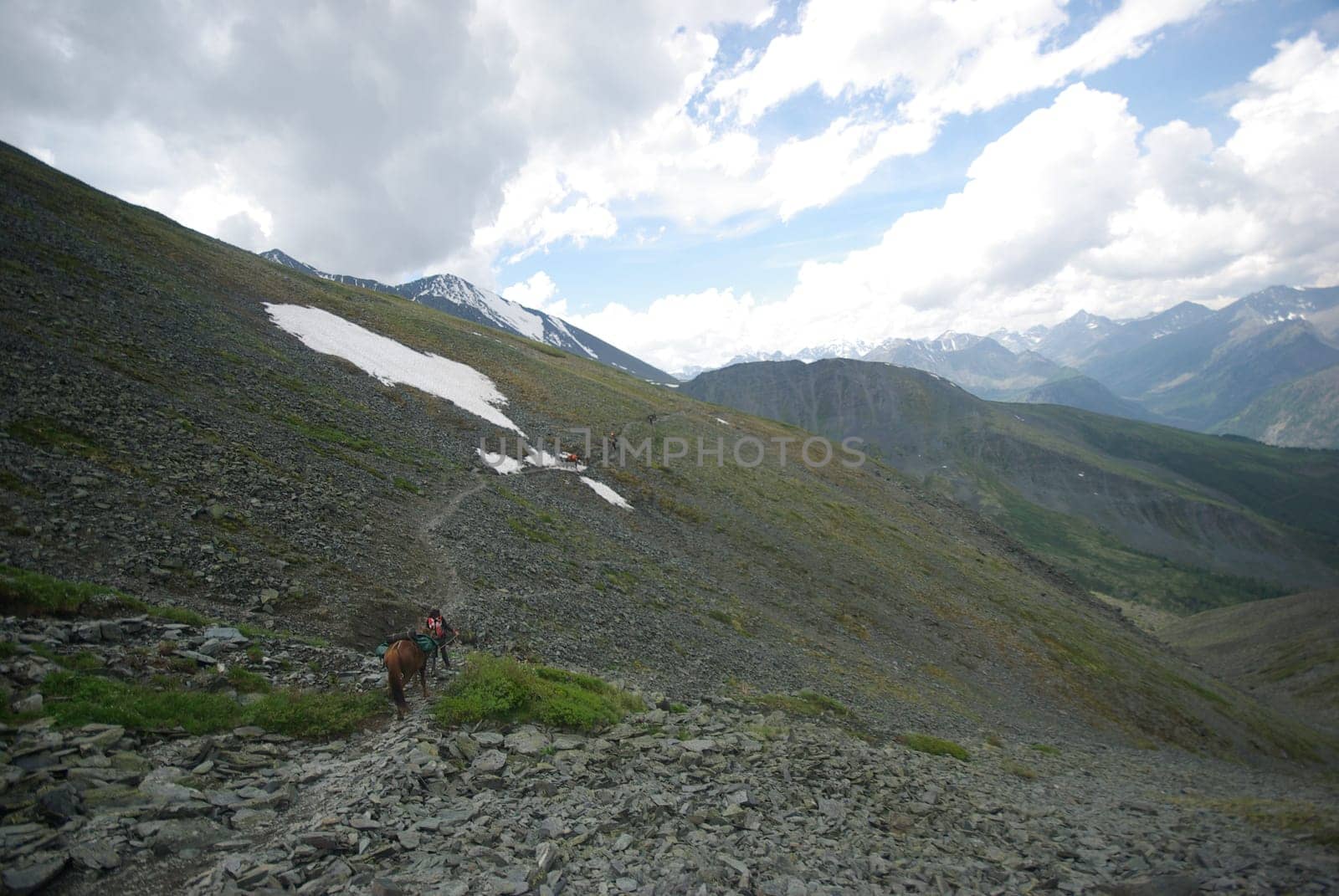 Mountain landscape. Highlands, the mountain peaks, gorges and valleys. The stones on the slopes.