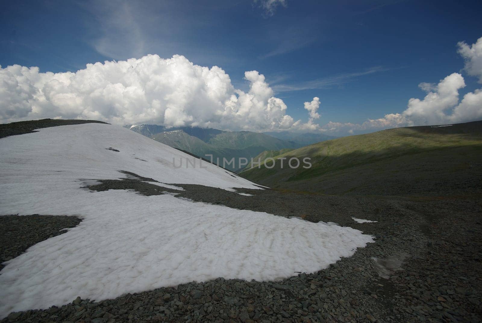 Mountain landscape. Highlands, the mountain peaks, gorges and valleys. The stones on the slopes.