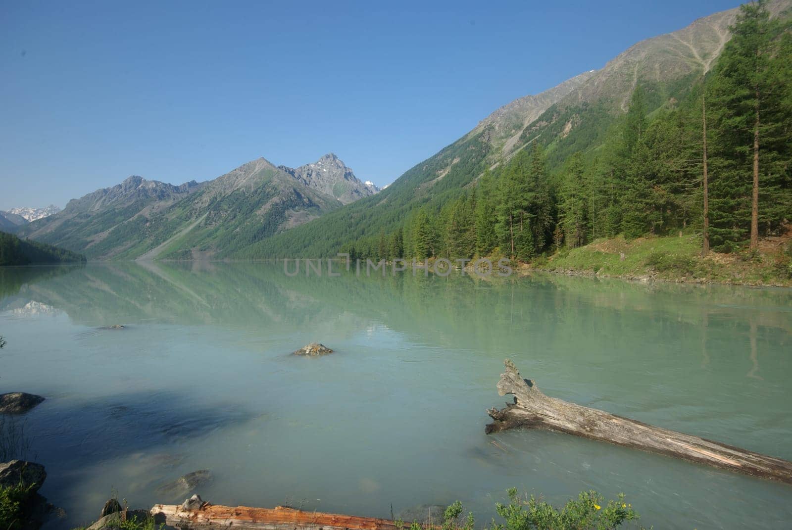Mountain landscape. Highlands, the mountain peaks, gorges and valleys. The stones on the slopes.