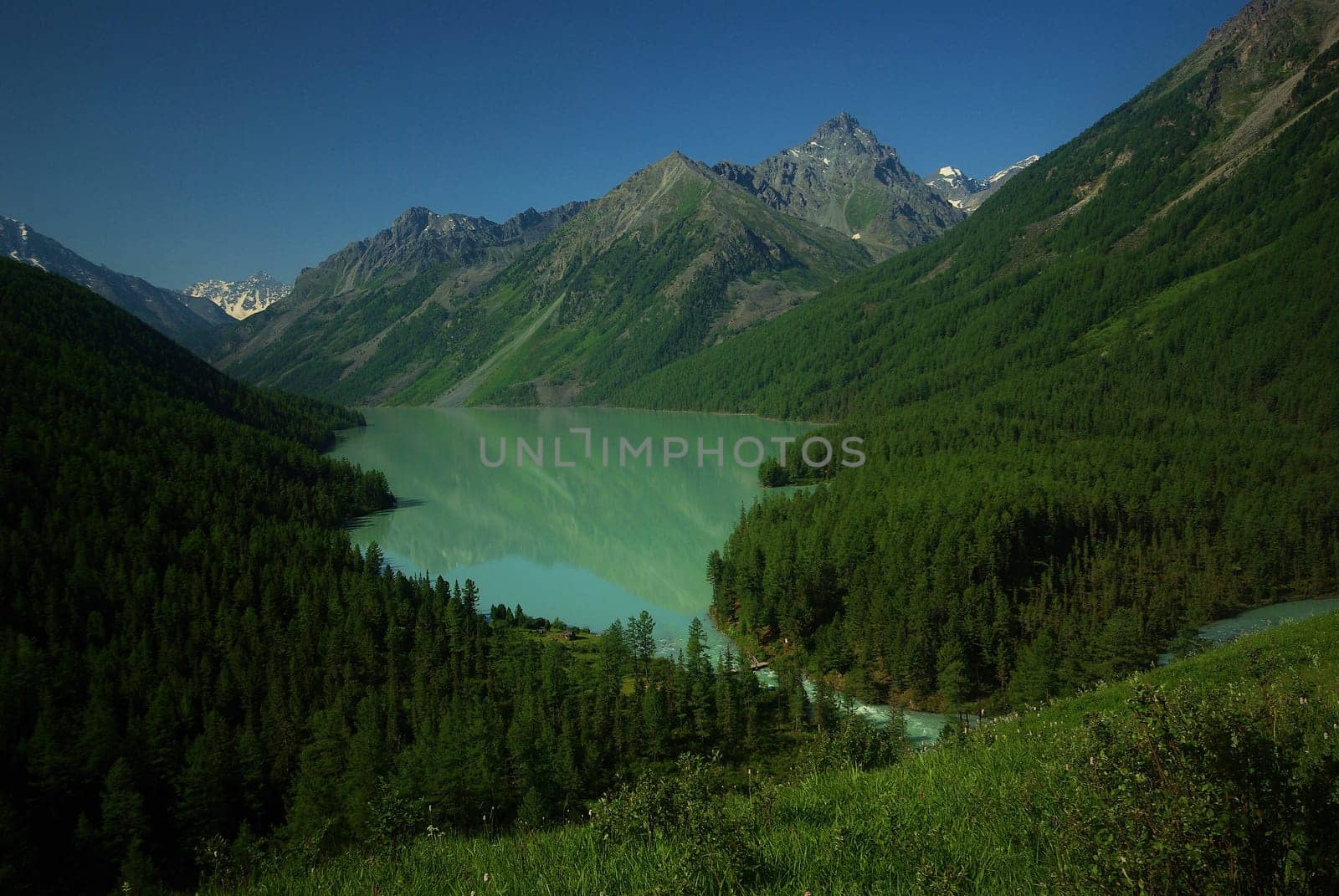 Mountain landscape. Highlands, the mountain peaks, gorges and valleys. The stones on the slopes.