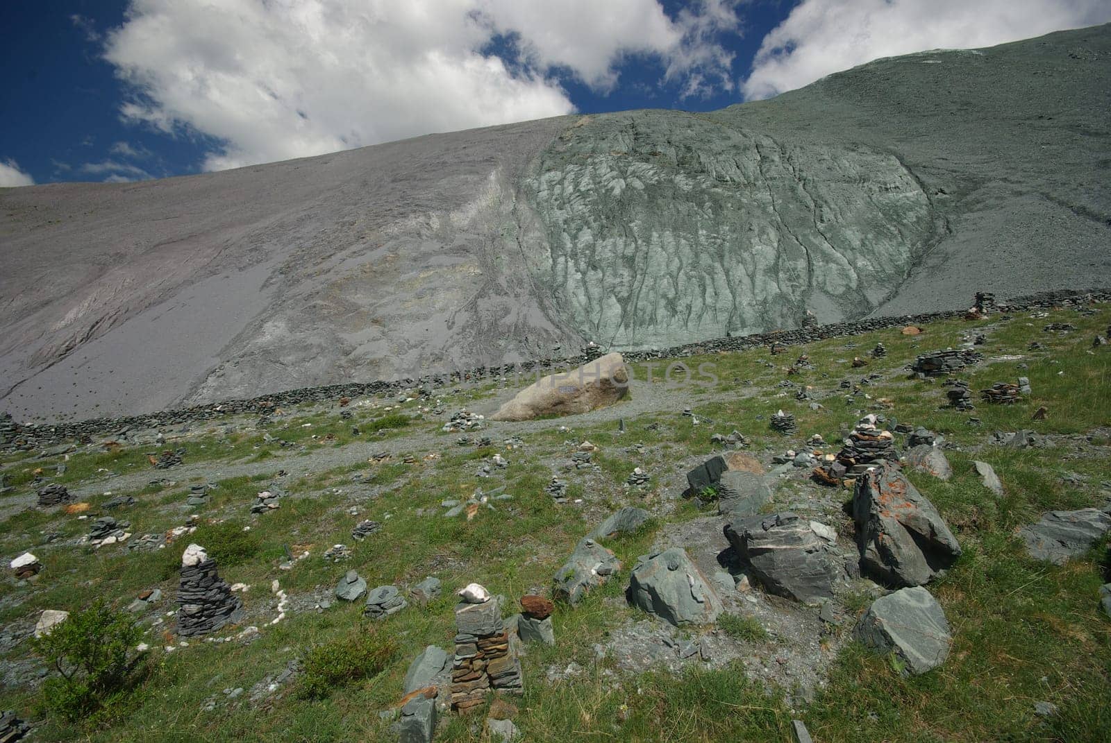 Mountain landscape. Highlands, the mountain peaks, gorges and valleys. The stones on the slopes.
