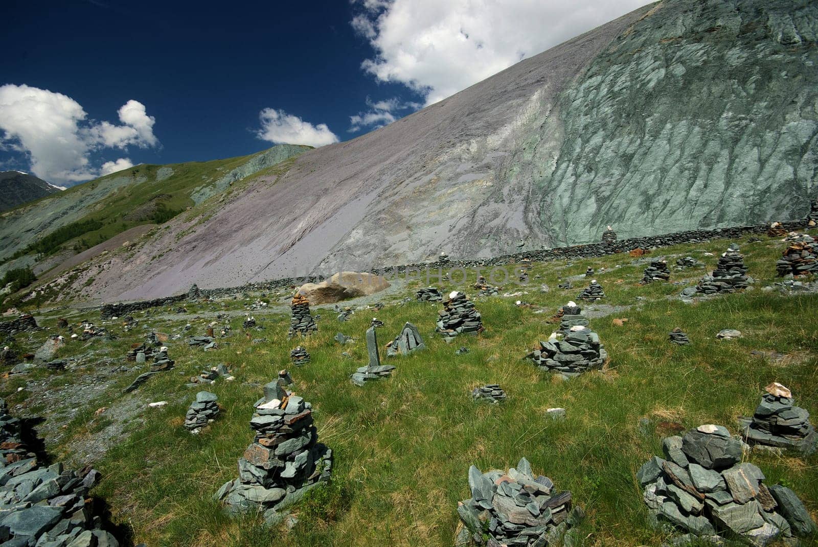 Mountain landscape. Highlands, the mountain peaks, gorges and valleys. The stones on the slopes.