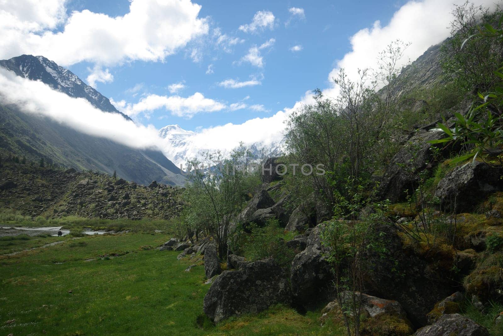 Mountain landscape. Highlands, the mountain peaks, gorges and valleys. The stones on the slopes.