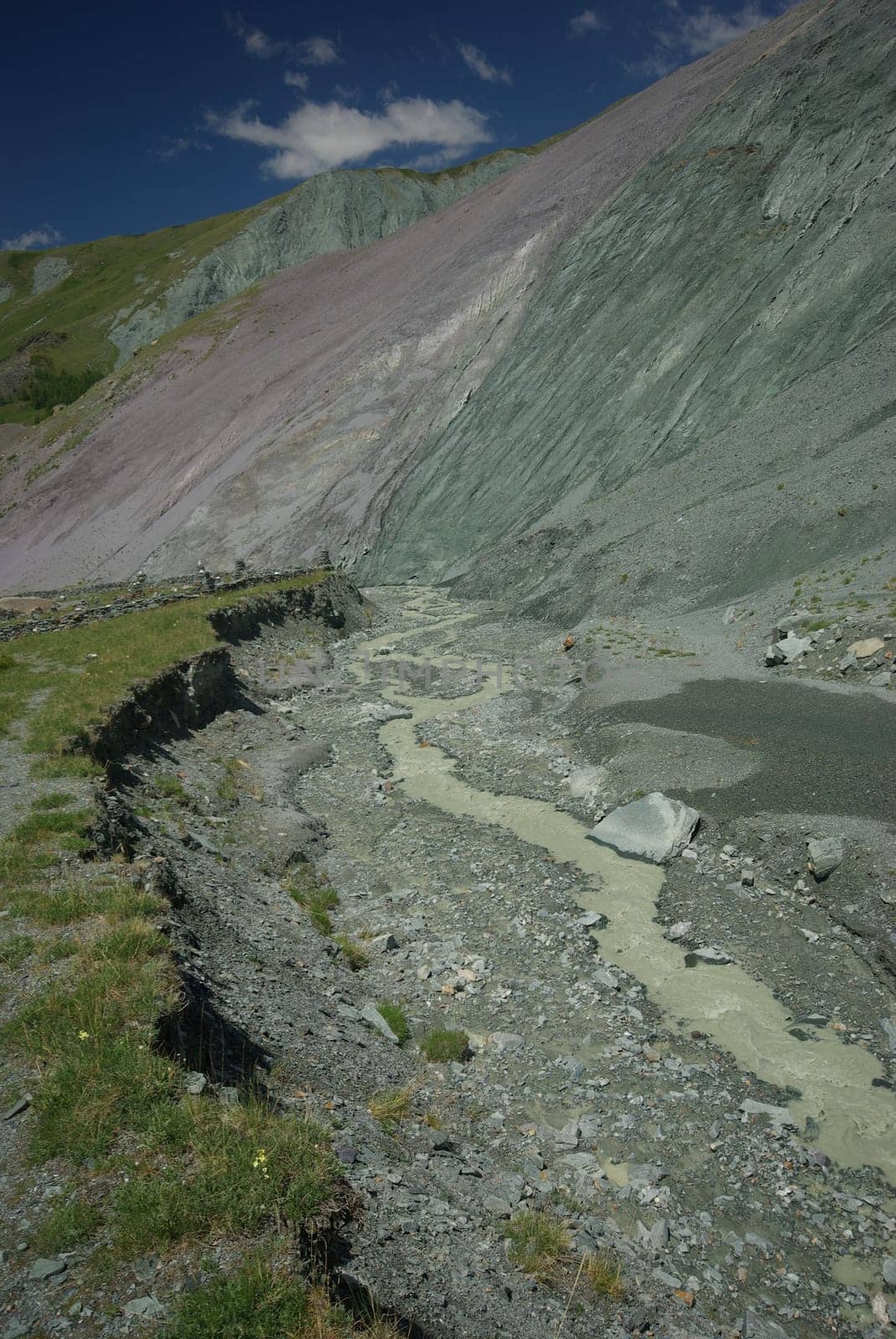 Mountain landscape. Highlands, the mountain peaks, gorges and valleys. The stones on the slopes.