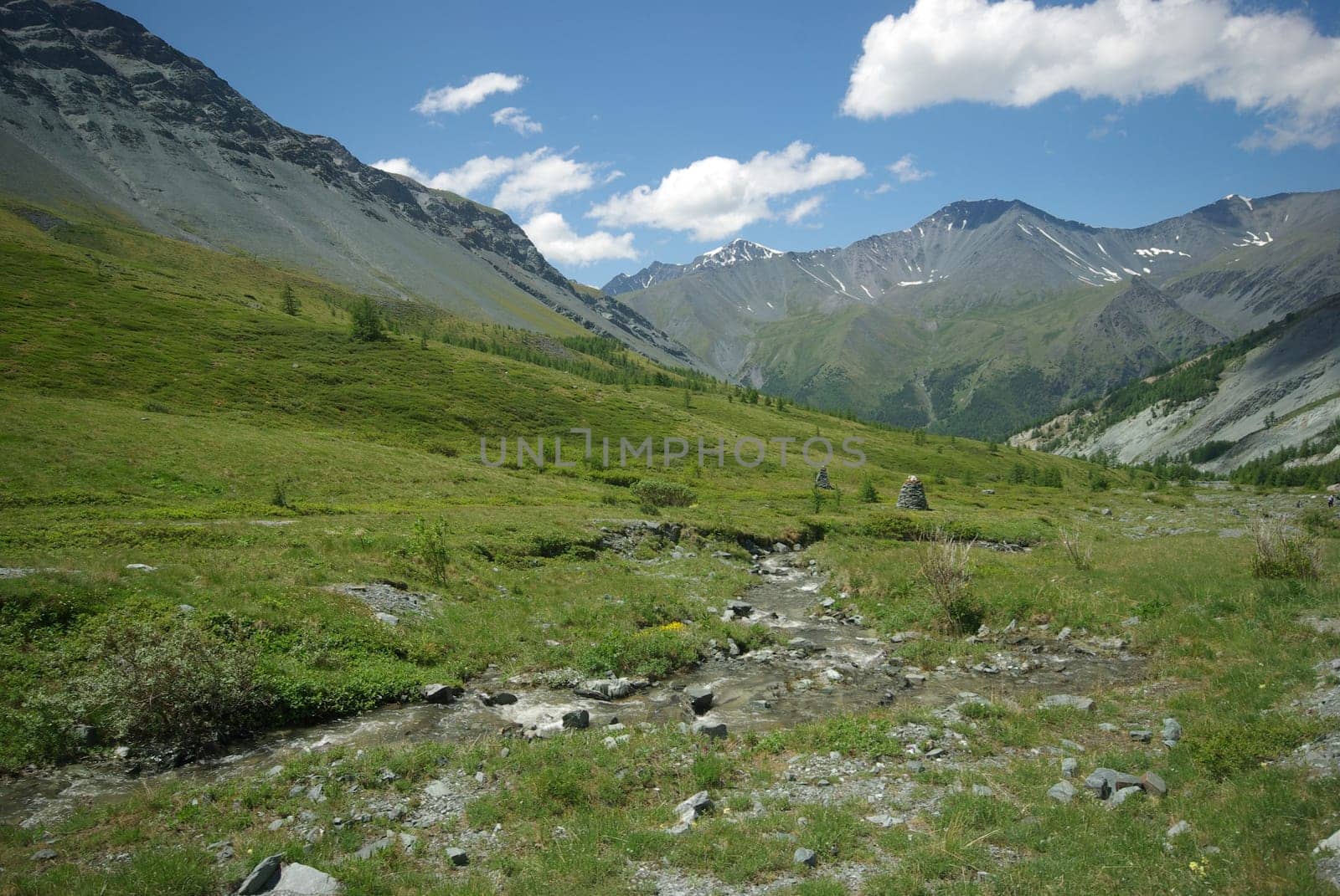 Mountain landscape. Highlands, the mountain peaks, gorges and valleys. The stones on the slopes.