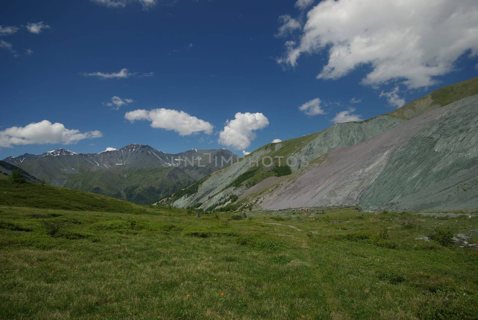Mountain landscape. Highlands, the mountain peaks, gorges and valleys. The stones on the slopes.