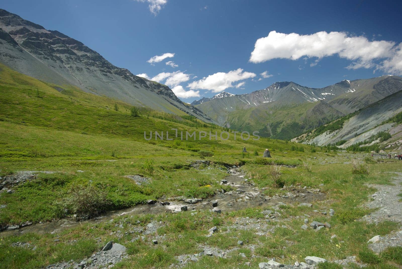 Mountain landscape. Highlands, the mountain peaks, gorges and valleys. The stones on the slopes.