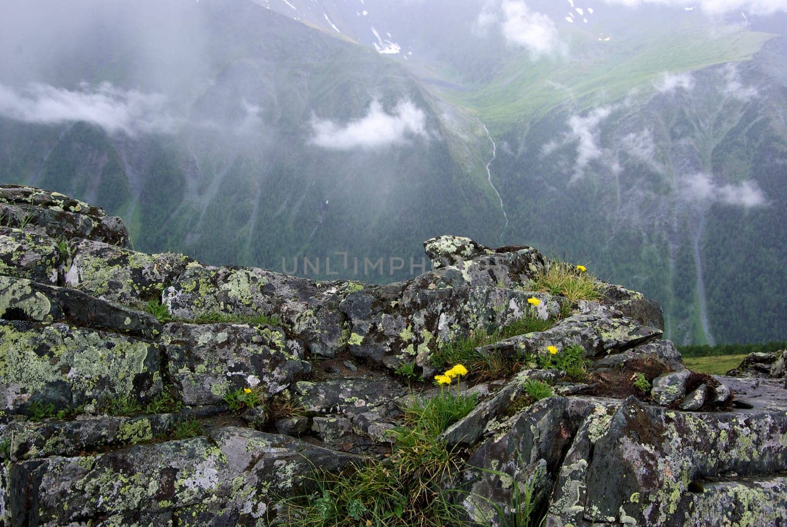 Mountain landscape. Highlands, the mountain peaks, gorges and valleys. The stones on the slopes.