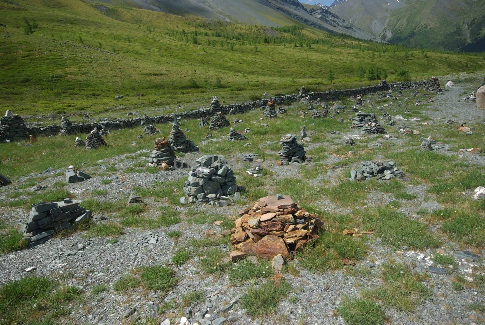 Mountain landscape. Highlands, the mountain peaks, gorges and valleys. The stones on the slopes.