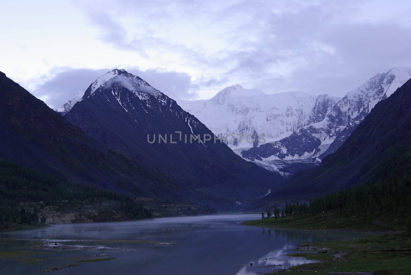 Mountain landscape. Highlands, the mountain peaks, gorges and valleys. The stones on the slopes.