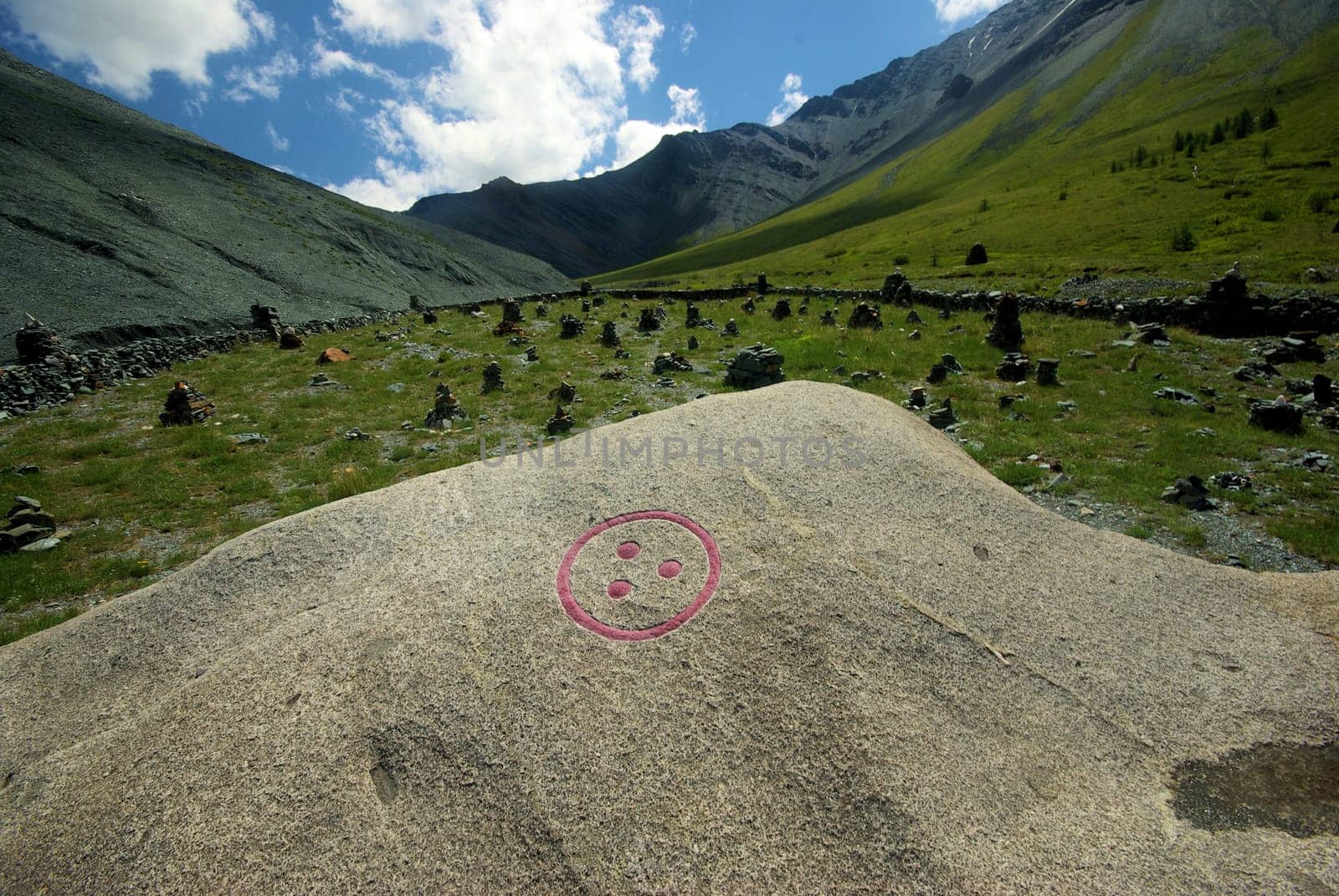 Mountain landscape. Highlands, the mountain peaks, gorges and valleys. The stones on the slopes.